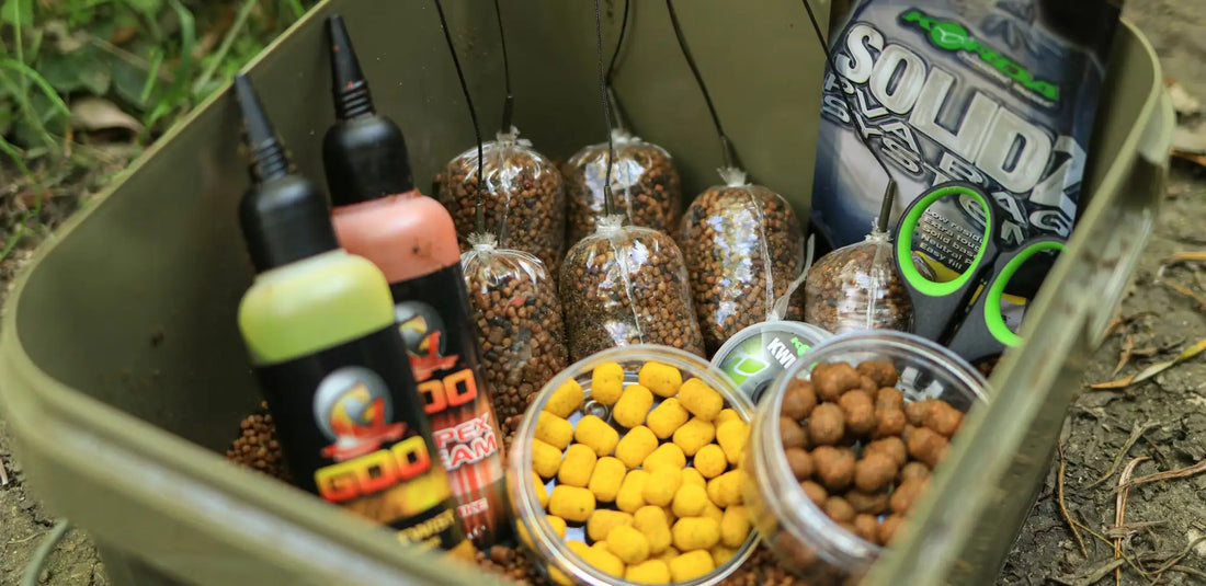 Green and black Fox 600 Bait Jam fishing bait bottle