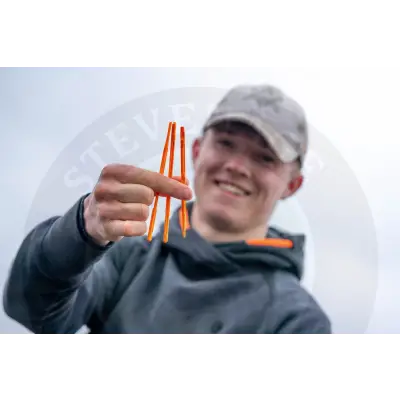 Bright orange disgorger medium fishing lure rods with textured grip held in hand durable fishing tackle stevenage bait