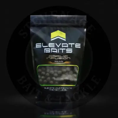 Black resealable pouch of elevate baits garlic infusion 18mm boilies with neon green trim and bold yellow logo displaying bait pellets