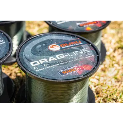 A spool of guru drag-line 10lb dark green monofilament fishing line 30mm 1000m length from stevenage bait