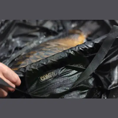 Korda - Compac Retainer Sling Dark Kamo KORDA