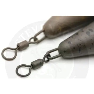 Dark gray metallic korda distance casting swivel 4oz fishing sinkers with speckled texture and swivel connectors for casting long distances