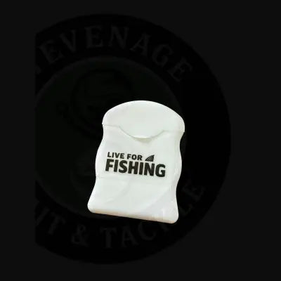 White plastic toothpick holder with live for fishing text featuring premium bait floss designed for fishing use