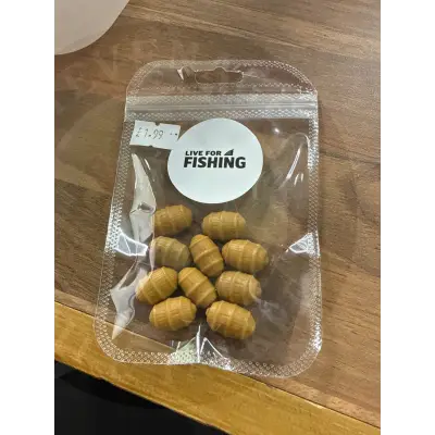 A clear plastic package of ten tan-colored fake tigernuts 10pcs fishing bait beads with live for fishing logo