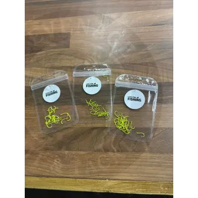 Three transparent resealable bags of live for fishing yellow carp barbless hooks 20pcs with branded stickers
