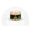 A clear plastic jar of mainline carp super buoyant pop-ups 13mm in pink white and yellow for fishing use
