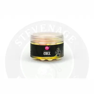 A clear jar of mainline mixed fluoro dumbell wafters in pink and yellow gummy bear shapes for fishing bait use