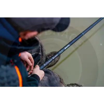 Black carbon fiber tackle guru-a-class whip fishing rod with white lettering and silver logo for simple whip setup
