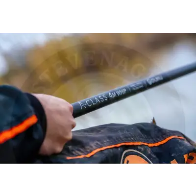 Black carbon fiber tackle guru-a-class whip fishing rod with orange stitching and white lettering for effective fishing