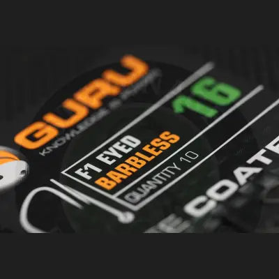 Black tackle guru f1 eyed barbless fishing lure packaging with orange and green text showing quantity 10 from stevenage bait