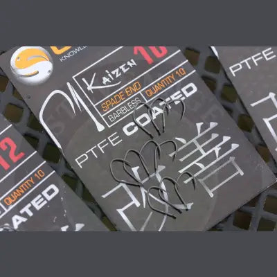Black ptfe-coated kaizen size spade-end barbless fishing hooks with unique pattern from tackle guru for stevenage bait
