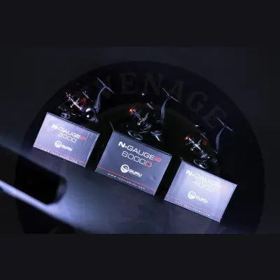 Three black and red n-gauge pro 3000 reels with plus spare spool displayed on branded boxes from pro reel range pre order