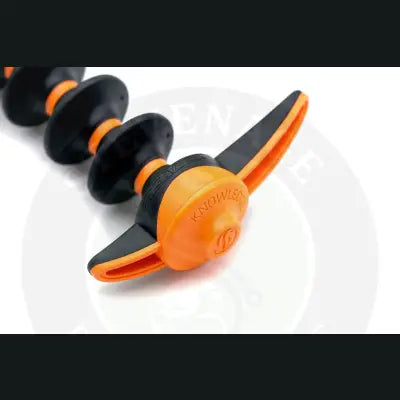 Orange and black segmented spinal decompression reaper rest with textured rubber overmould grip from stevenage bait