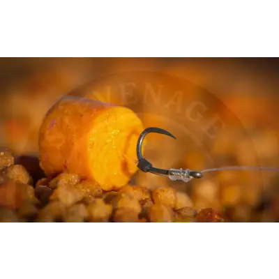 A bright orange cylindrical fishing bait with a black hook attached from tackle guru smwg standard hooklength option
